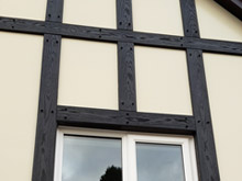 Black tudor boards with ivory render board replacement